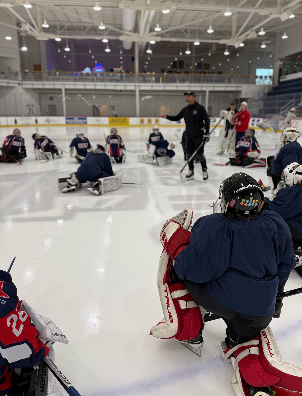 Goalie listening on the ice